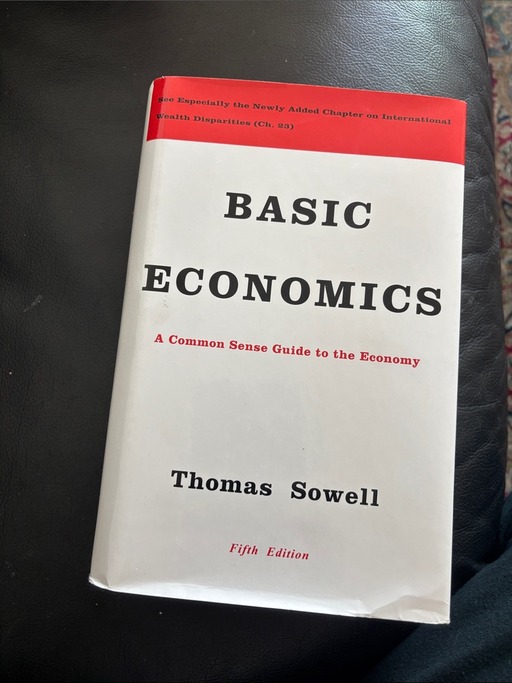 Basic Economics by Thomas Sowell - White & Red Paperback